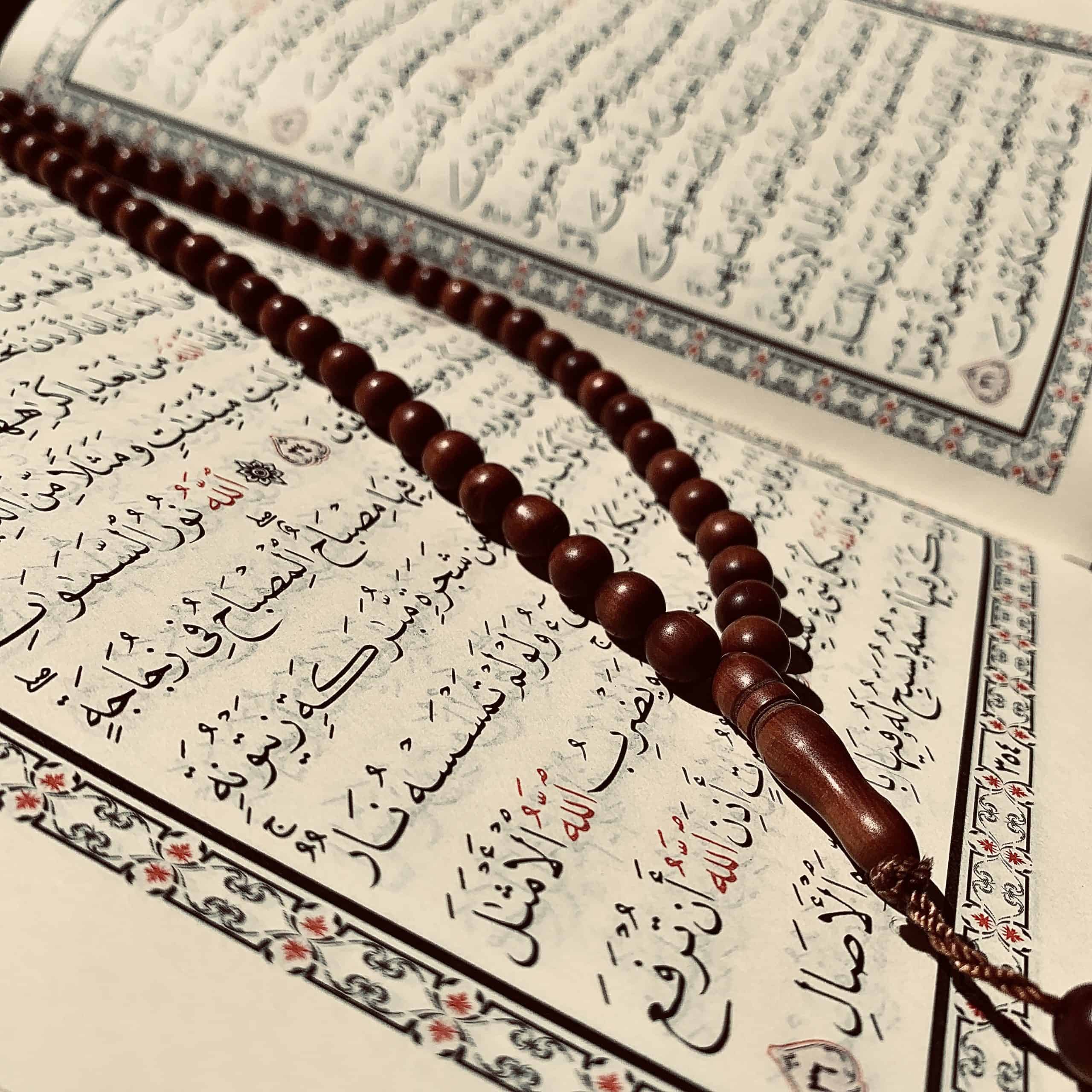 can a woman recite the quran on her period?